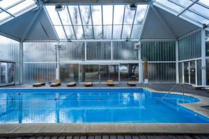 Pioneros Suites by Grupo Tierra Gaucha con Gimnasio